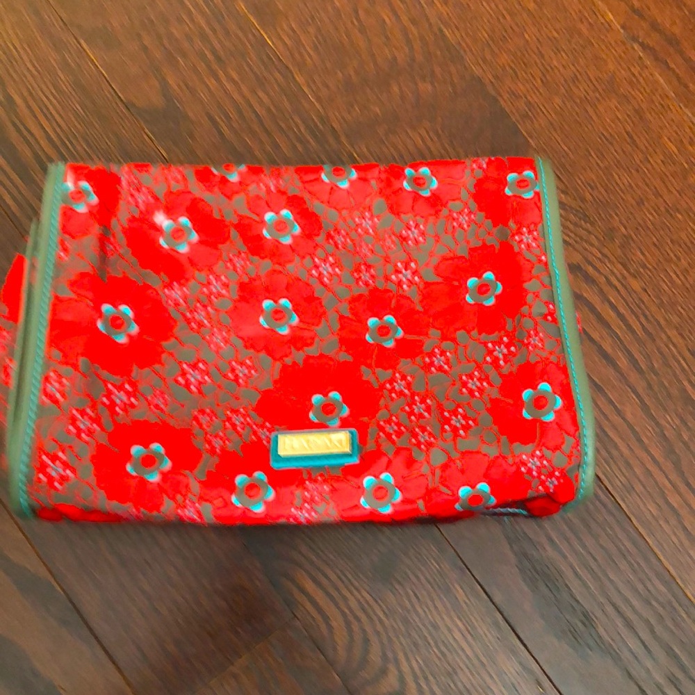 Hadaki women’s cosmetic travel bag over the door